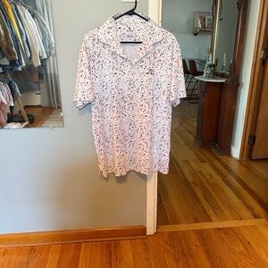 Rhoback White Polo with Blue and Red Speckle Pattern and USA flag.